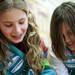 Girl scouts Violet Dudley and Maggie Packard (left to right finish blankets to send to the New Hope Baptist Church in Newark, New Jersey on Tuesday, Jan. 22. Daniel Brenner I AnnArbor.com